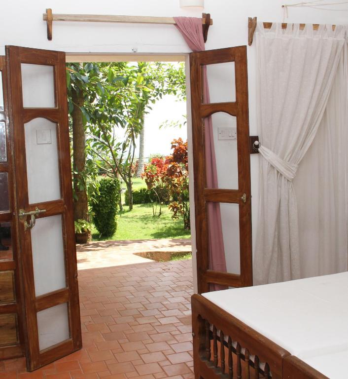 The Eco Hotell Varkala Rum bild